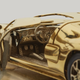 Illustration for article titled This Tiny 18-Karat Gold Ford GT Model Car Will Only Cost You About $40,000